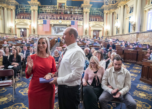 Rep. Catherine Wallen (R-Adams/Cumberland) takes the oath of office as her husband, Dave, looks on to begin her first term representing the people of the 193rd Legislative District. 